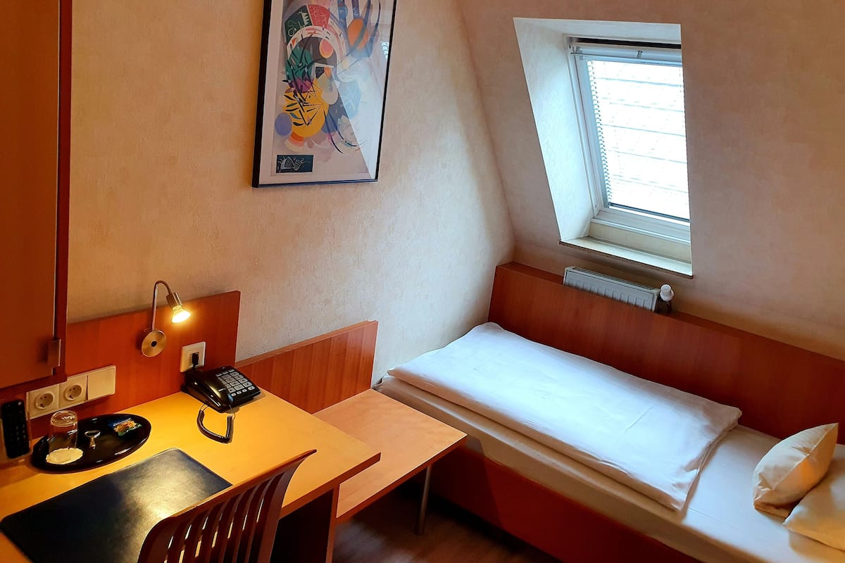 Desk, laptop workspace, blackout curtains, free WiFi