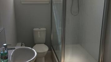 Shower, free toiletries, hair dryer, towels