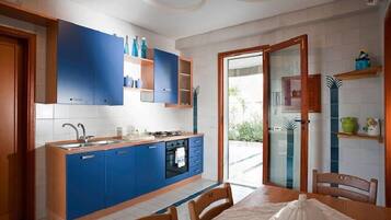 Villa, 3 Bedrooms | Private kitchen | Full-size fridge, oven, stovetop, dishwasher