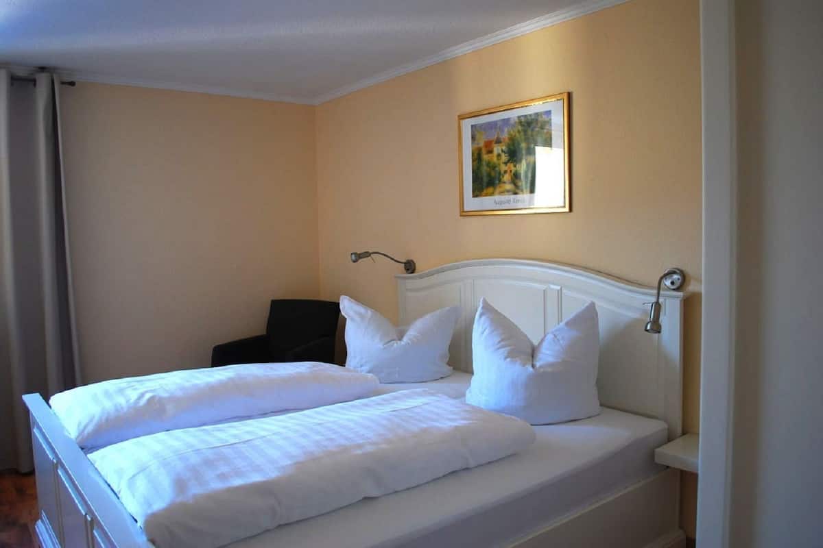Desk, free WiFi, bed sheets