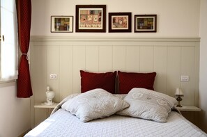 Desk, blackout drapes, iron/ironing board, rollaway beds