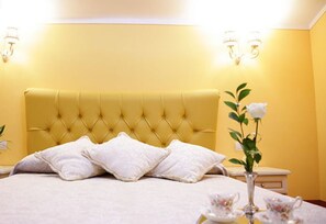 ห้องดีลักซ์สำหรับสี่ท่าน | มินิบาร์, ตู้นิรภัยในห้องพัก, โต๊ะทำงาน, Wi-Fi ฟรี