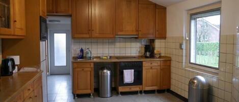 Appartement, 6 slaapkamers | Privékeuken | Een koelkast met diepvriezer, een microgolfoven, een oven, een kookplaat