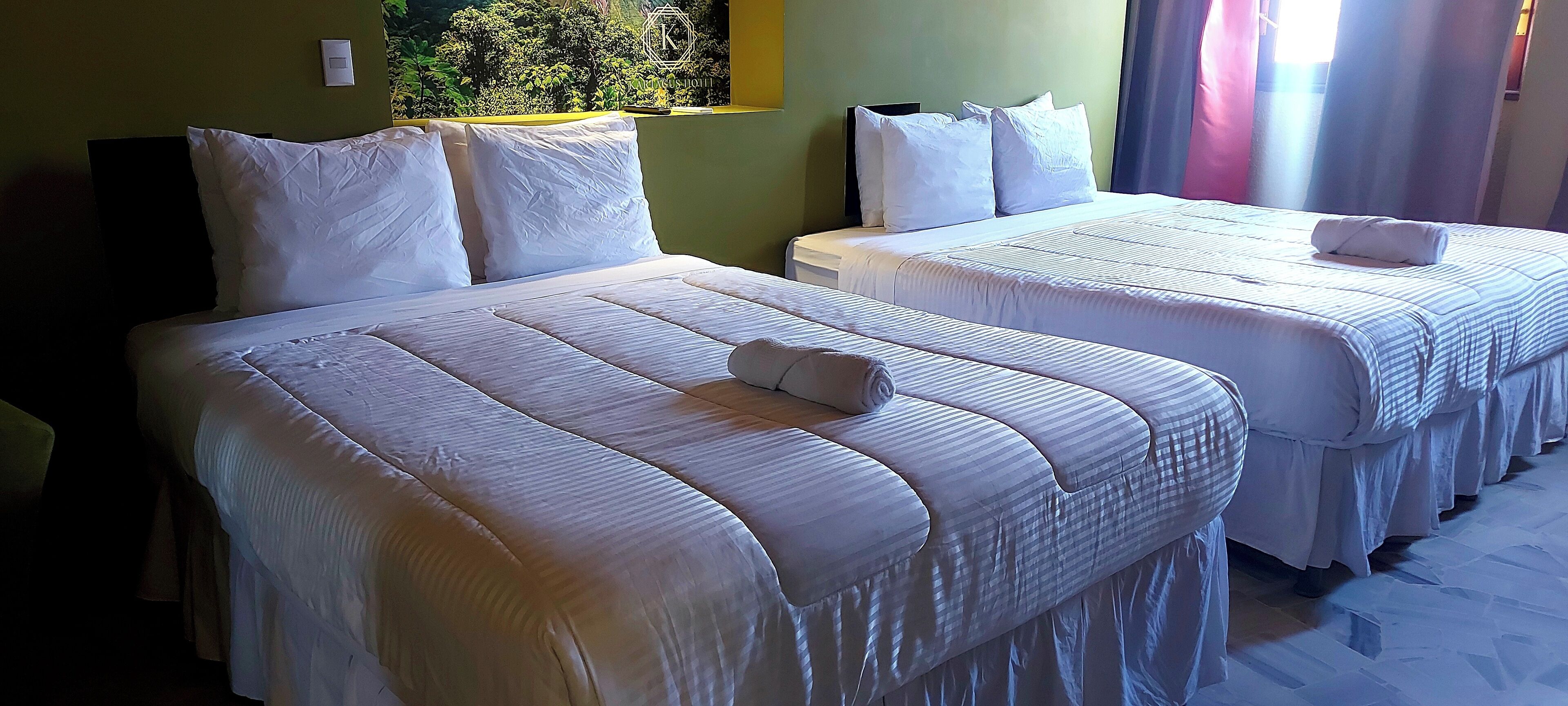 deluxe double room with two double beds | premium bedding, down duvets, pillow-top beds, minibar