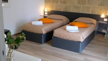 5 kamar tidur, seprai premium, minibar, dan meja kerja