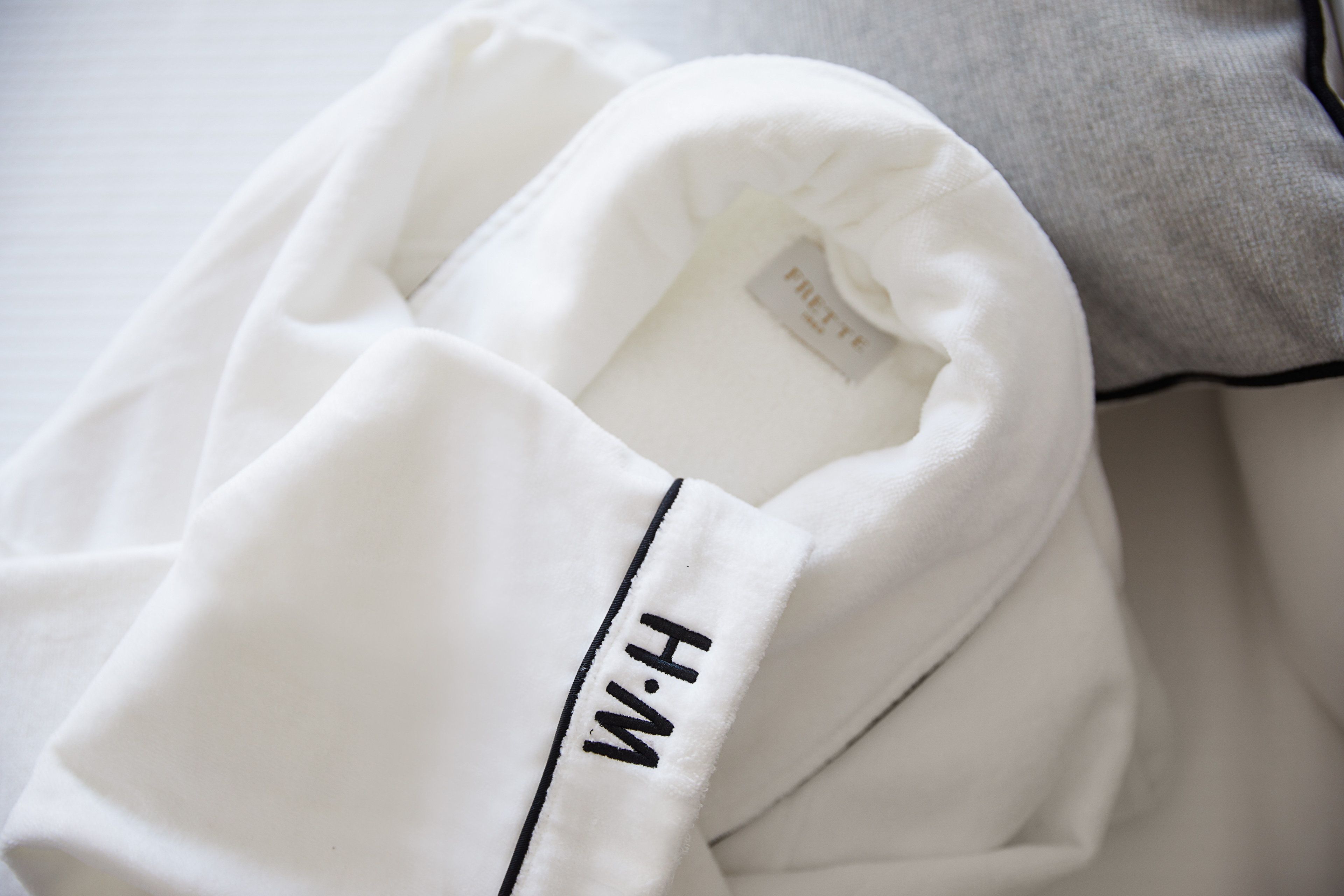 hair dryer, bathrobes, slippers, towels