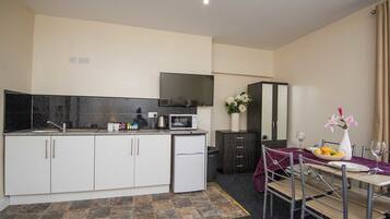 Executive Studio, Multiple Beds | Private kitchenette | Full-sized fridge, microwave, electric kettle, toaster