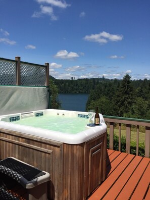 A hot tub on a wooden deck with a lake view. - Spectacular lake view! (Mossyrock)