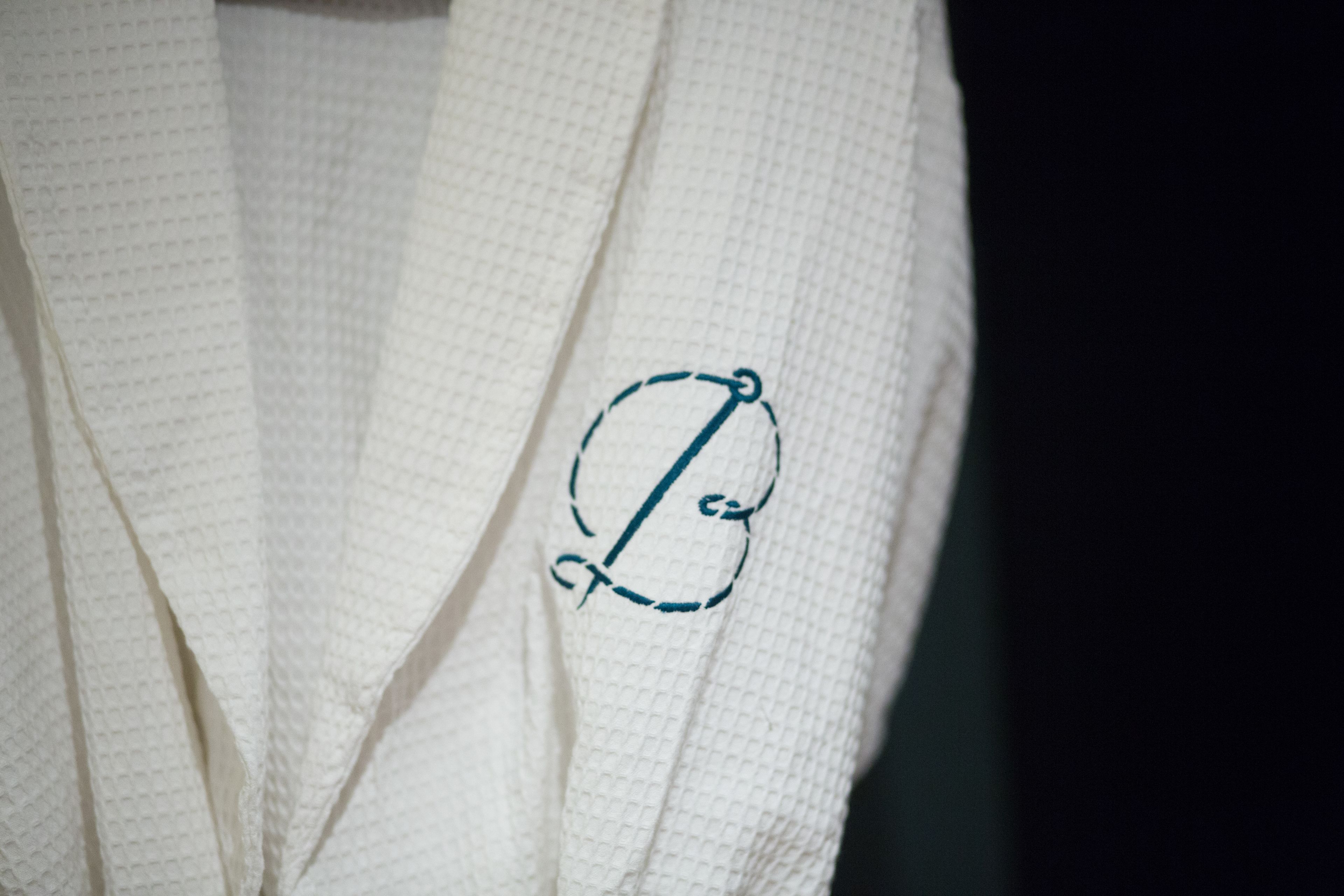 shower, designer toiletries, hair dryer, slippers