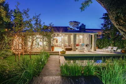 Enchanting 4 bed/4bath just one block from the beach, in private secluded garden