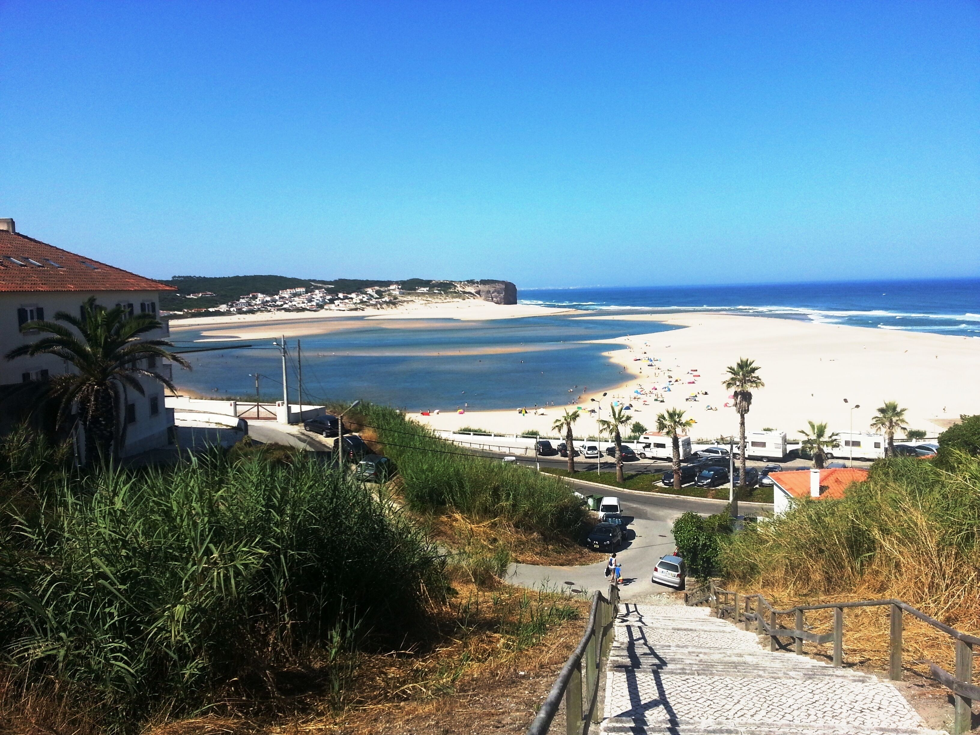 On the beach, sun loungers, beach towels