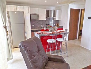 Apartment, 1 Bedroom | Private kitchen - Skyline 203 by PRP (Playa del Carmen)