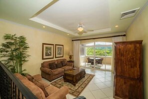 Condo, Multiple Beds (Los Suenos Resort Colina 5D) | Living room | Flat-screen TV - Los Suenos Resort Colina 5D (Jacó)
