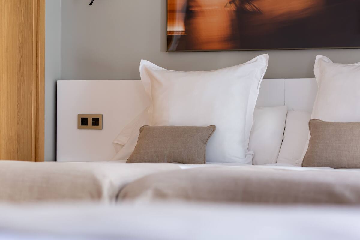 Standard Quadruple Room, Multiple Beds, Non Smoking, City View | In-room safe, iron/ironing board (on request), WiFi (free), bed sheets