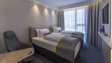 Verduisterende gordijnen, geluiddichte muren