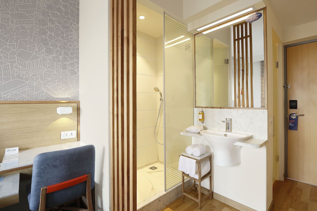 shower, hair dryer, slippers, bidet