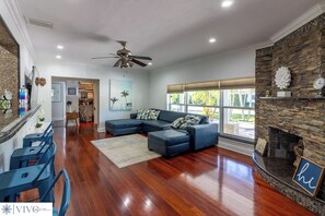 Interior - Modern Hollywood Beach villa with a private heated saltwater pool, hot tub, and spacious family-friendly layout. Just 1 mile from the ocean & Broadwalk, featuring a full kitchen, open living areas, and tropical outdoor lounge spaces. (Hollywood)
