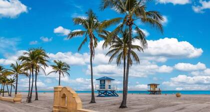 Luxurious Coastal Retreat in Hollywood Beach featuring a private salt water heated pool & hot tub