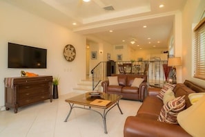 Condo, Multiple Beds (Los Suenos Resort Colina 8E) | Living room | Flat-screen TV