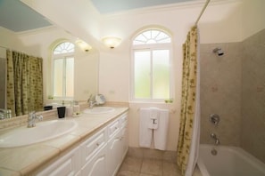 Condo, Multiple Beds (Los Suenos Resort Colina 8E) | Bathroom | Combined shower/tub, deep soaking tub, free toiletries, hair dryer