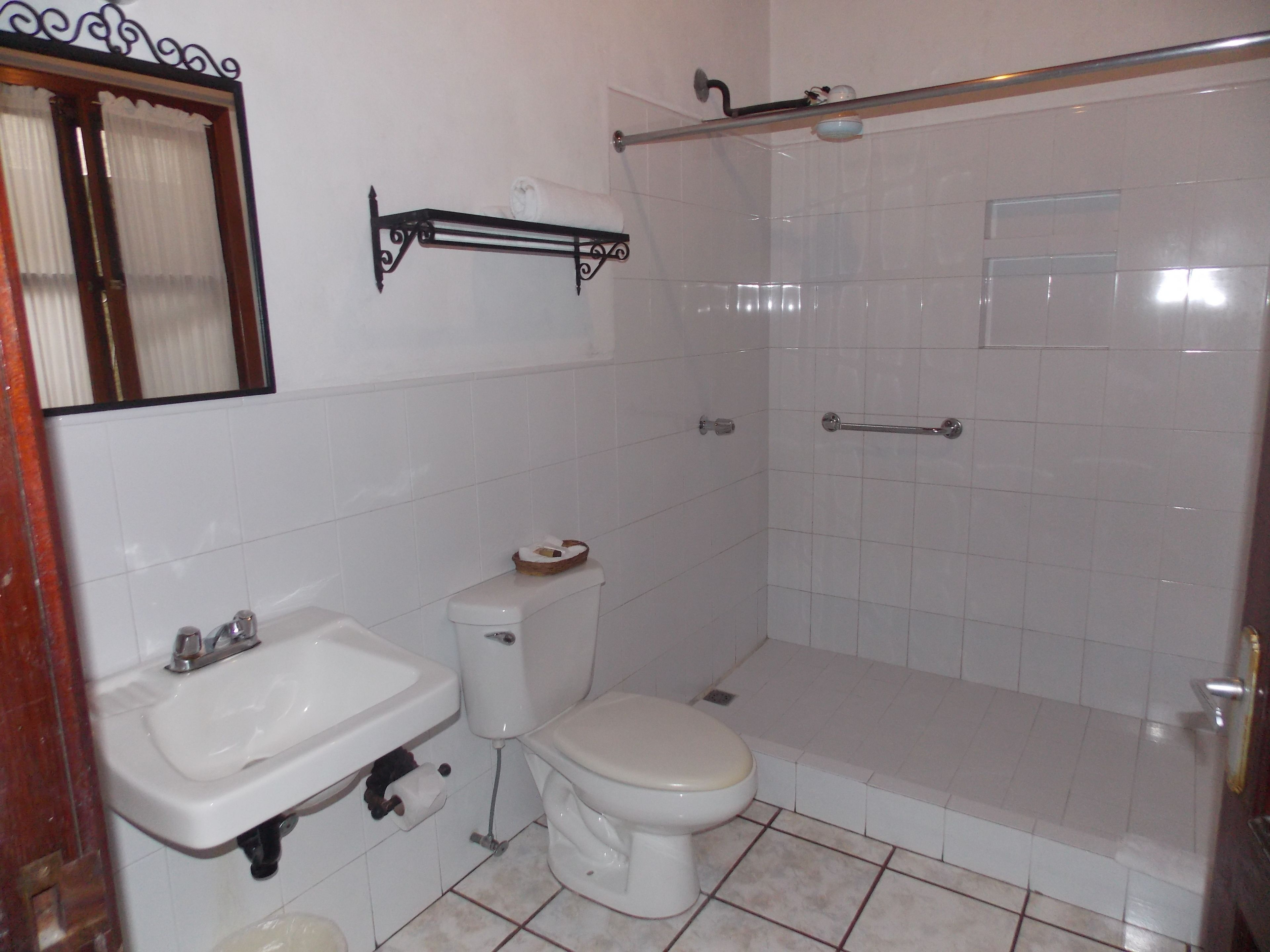 double room, 2 queen beds, accessible, non smoking | bathroom | shower, towels