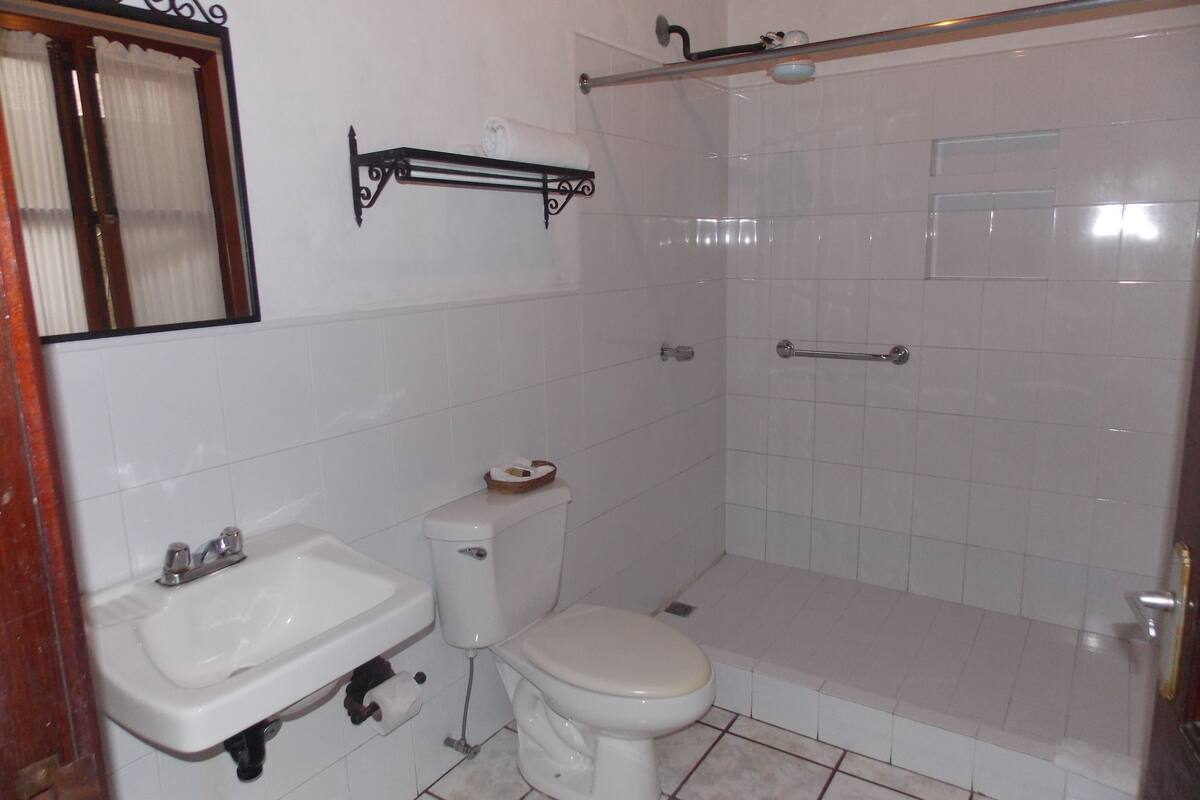 double room, 2 queen beds, accessible, non smoking | bathroom | shower, towels