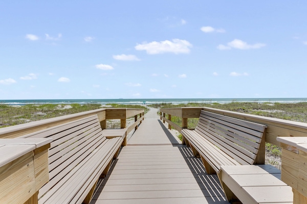 The new walkover bridge has ramps so everyone can get to the beach. Benches too!
