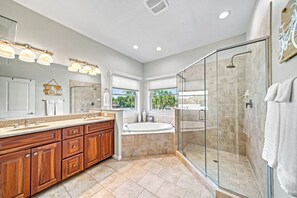 Bathtub, hair dryer, towels
