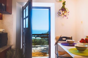 Dining - Nausica House: Cosy renovated cottage, stunning views of Agni Bay (49083)