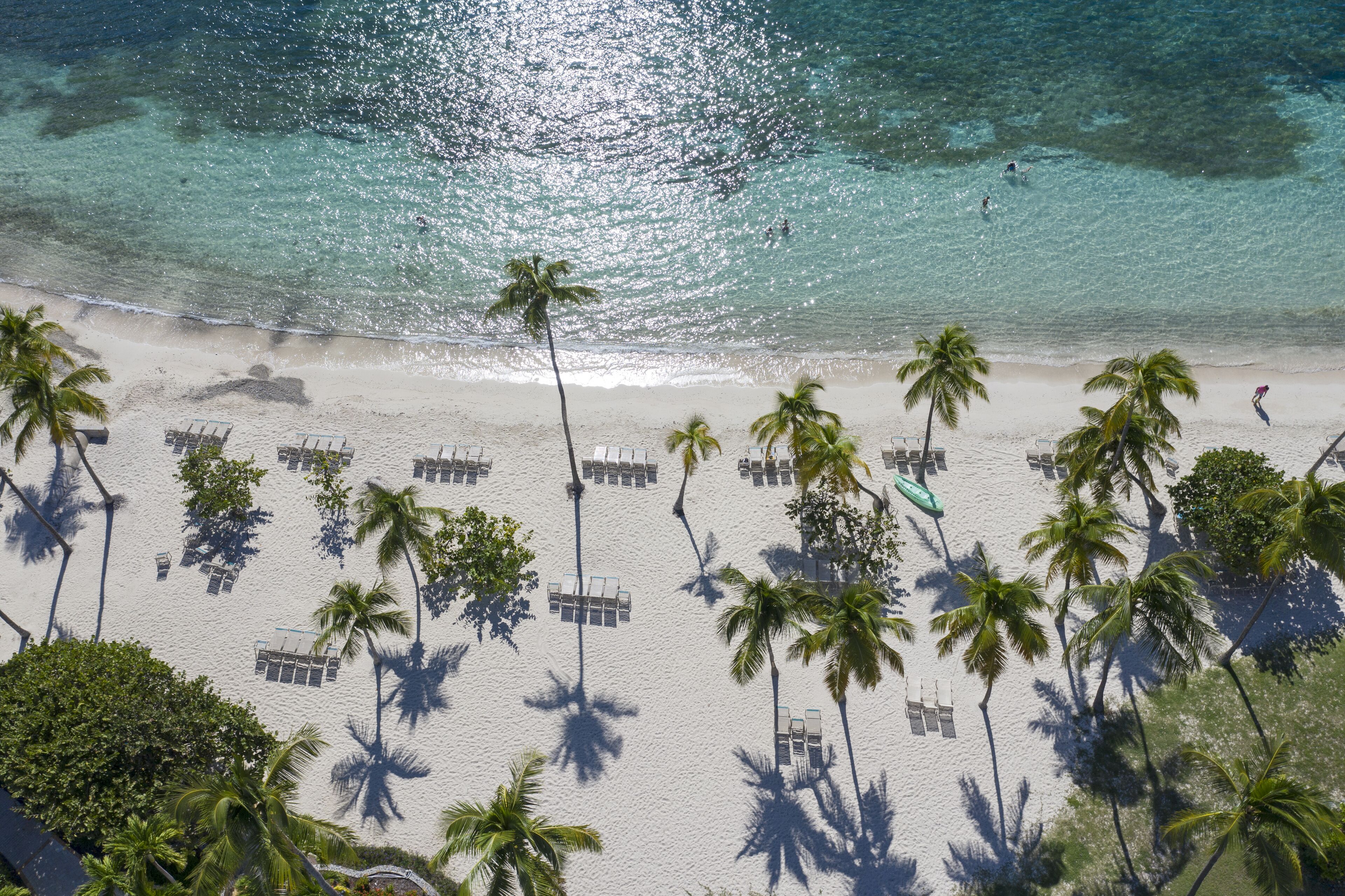 On the beach, sun-loungers, beach towels