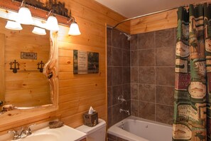 Combined shower/tub, hair dryer, towels, soap