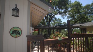 A wooden gate with a sign reading "Welcome to Catt's."