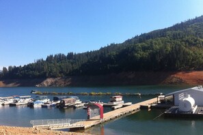 Enjoy serene lakeside views and easy access to sailboats and motorboats at this picturesque marina.