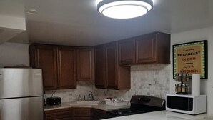 Executive Apartment | Private kitchenette | Espresso maker, coffee/tea maker, full-sized fridge, microwave - Riverview Apartments 15 mins to NYC (Jersey City)