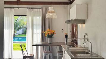 Signature Double Room | Private kitchen | Full-sized fridge, microwave, stovetop, electric kettle