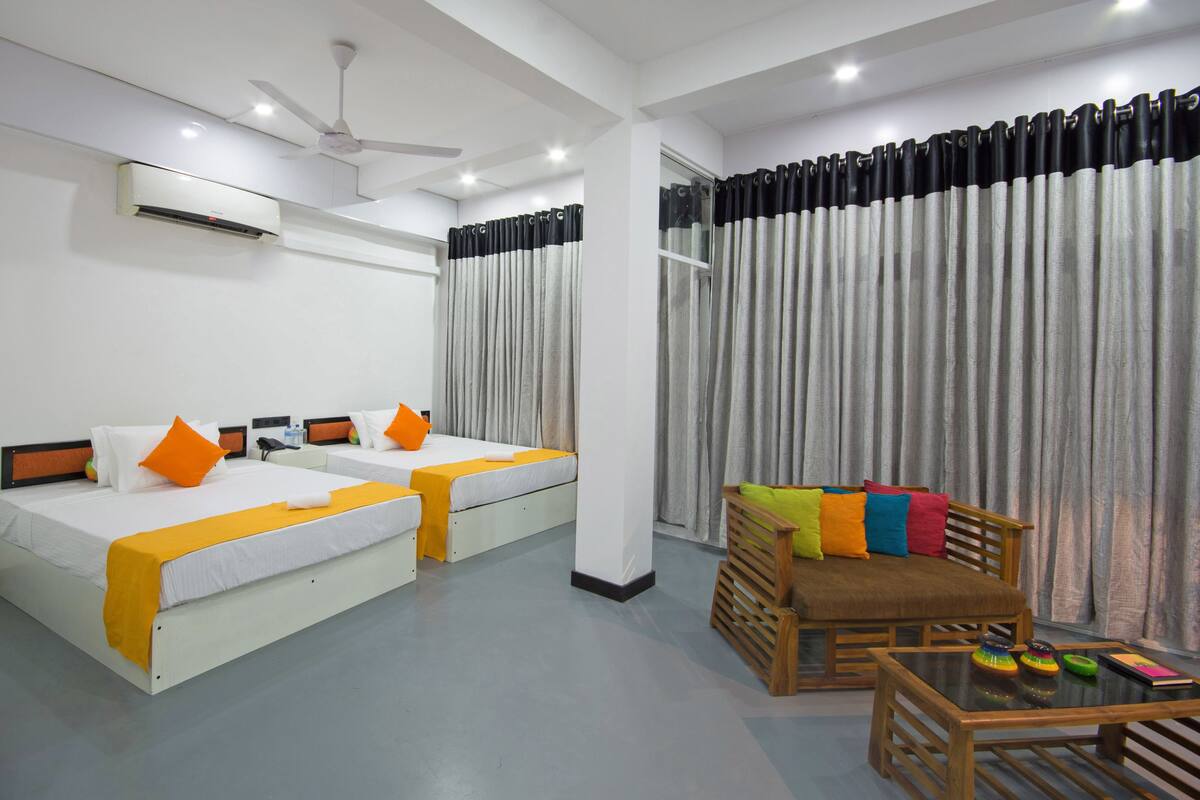 Deluxe Quadruple Room, 2 Double Beds, Balcony, Mountain View | Egyptian cotton sheets, premium bedding, in-room safe, desk
