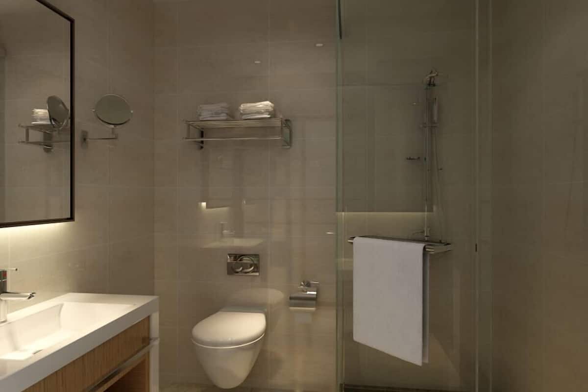 deluxe room, 1 king bed | bathroom sink