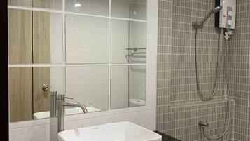 Shower, free toiletries, hair dryer, slippers