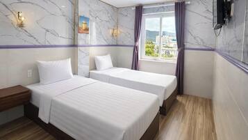 Luksus-dobbeltrom for 1 person, byutsikt | Senger med overmadrass, minibar, lydisolert og wi-fi (inkludert)