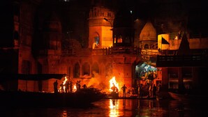 A historic building with domed architecture and a large open space in front. - Family Guest House (Varanasi)
