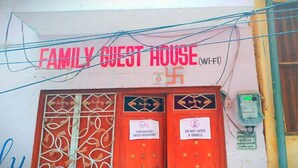 A building with a sign reading "FAMILY GUEST HOUSE (Wi-Fi)". - Family Guest House (Varanasi)