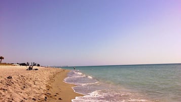 Private beach, sun-loungers, beach umbrellas, snorkelling