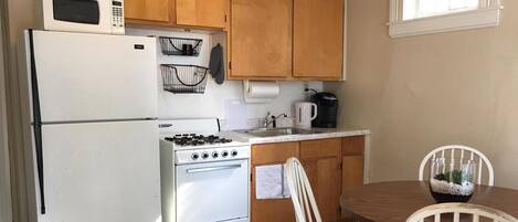 Microwave, coffee/tea maker, cookware/dishes/utensils