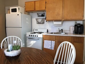 Microwave, coffee/tea maker, cookware/dishes/utensils