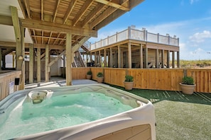 Terrace/patio - Oceanfront Serenity Sands in Oak Island, NC, boasts 8 bedrooms for 20 guests. (Oak Island)