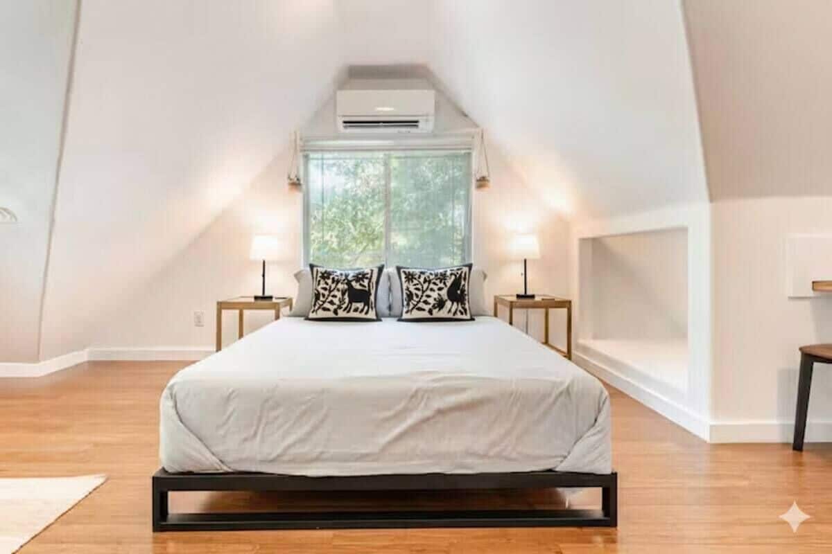 1 bedroom, desk, iron/ironing board, travel crib