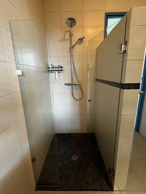 Shower, hair dryer, towels, soap