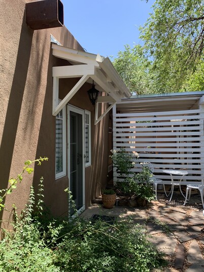 Luxurious and sanitized Studio, original adobe walls, wood floor, real sanctuary