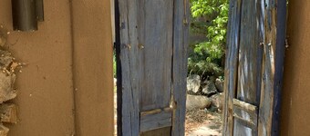 Luxurious and sanitized Studio, original adobe walls, wood floor, real sanctuary