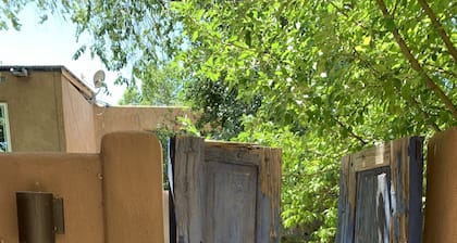 Luxurious and sanitized Studio, original adobe walls, wood floor, real sanctuary